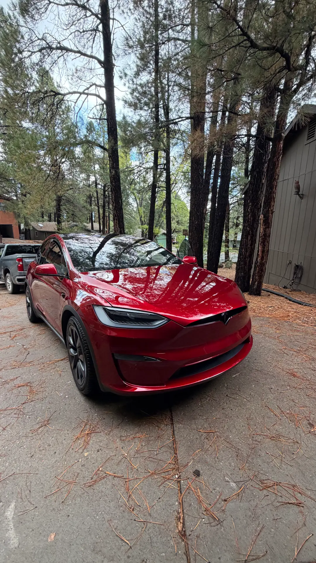 Red Tesla Model X exterior after detail
