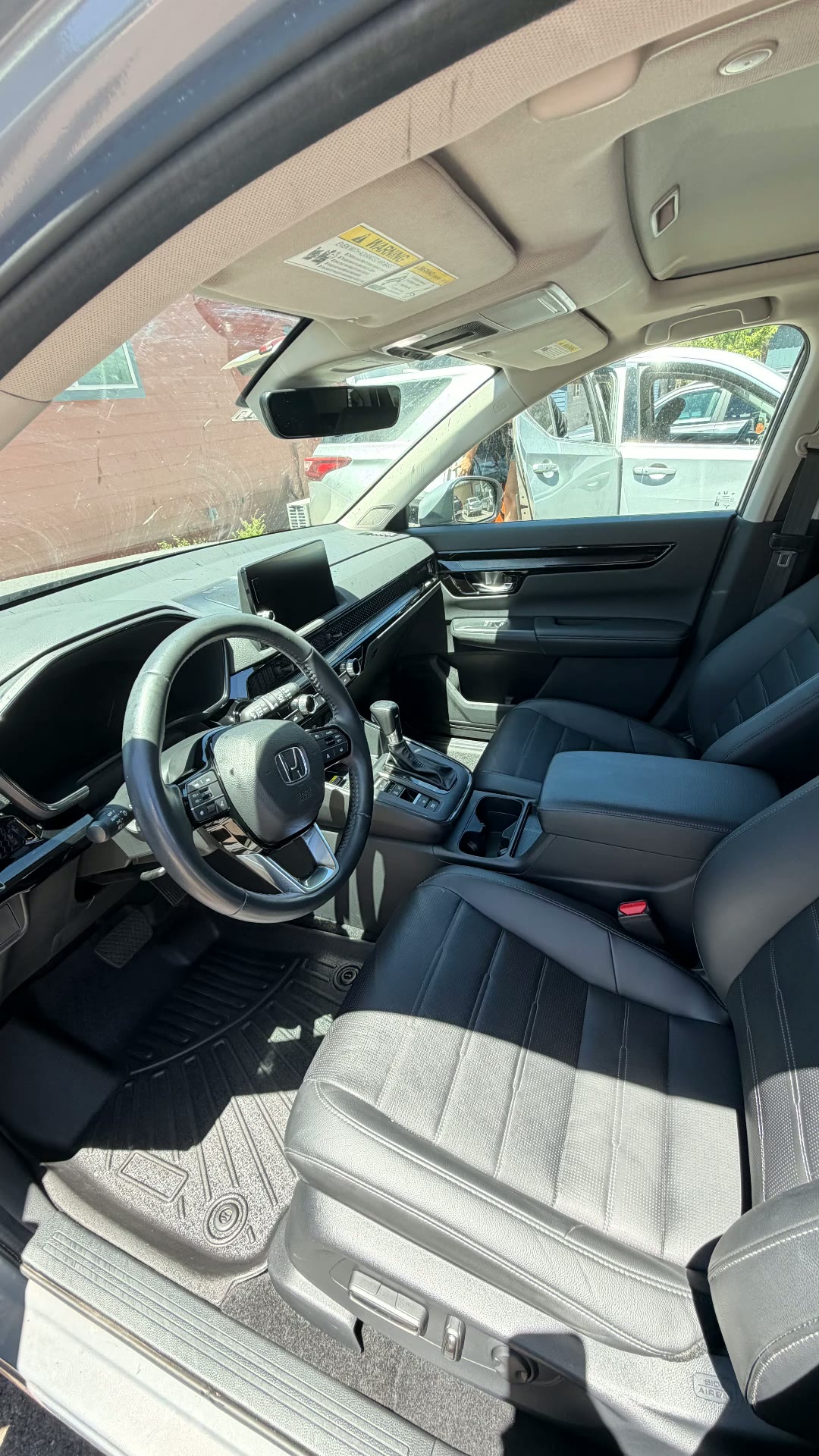 Honda CR-V black leather front interior after detail