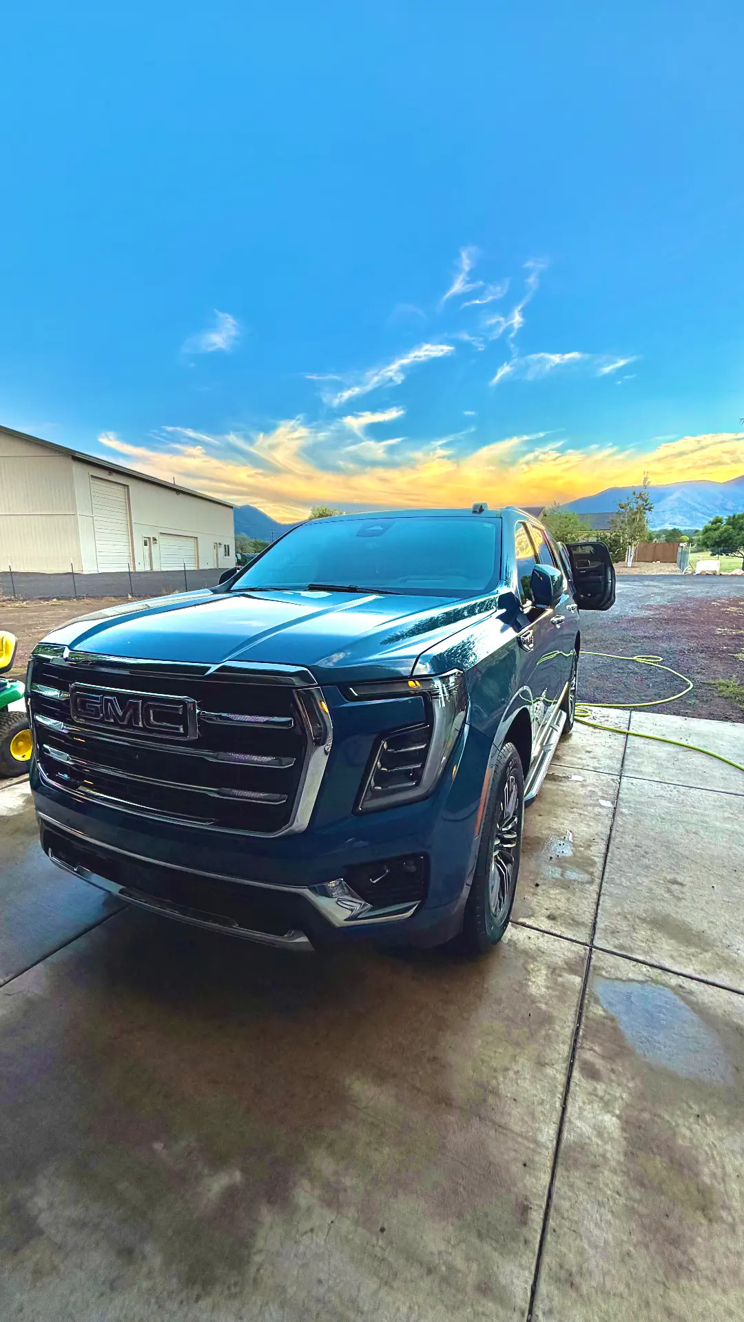 GMC Yukon glossy paint at sunset