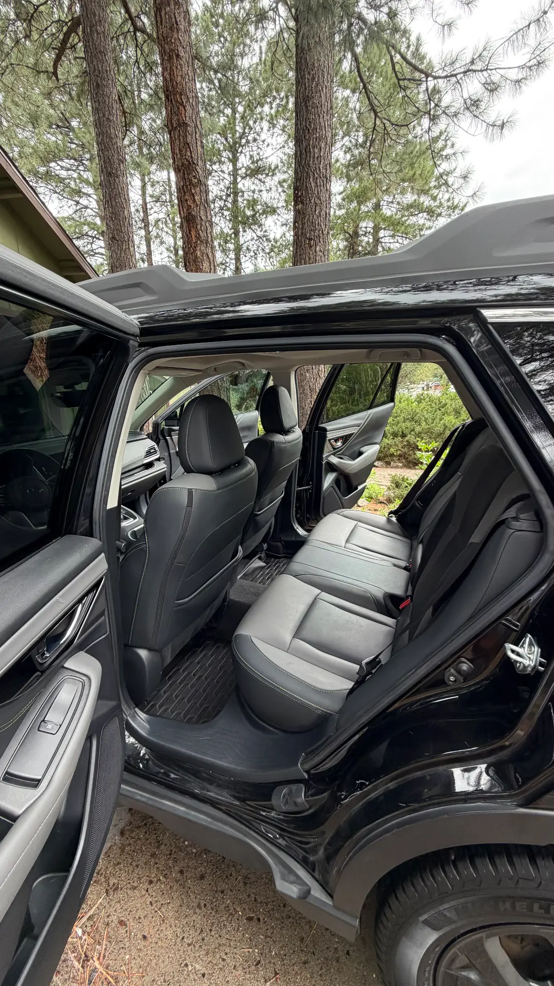 Black Subaru Outback rear seats after detail