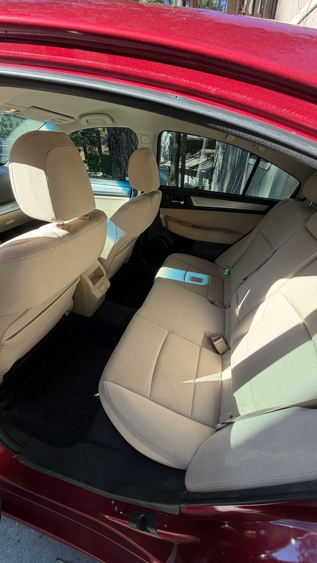 Red Subaru Legacy rear bench after detail