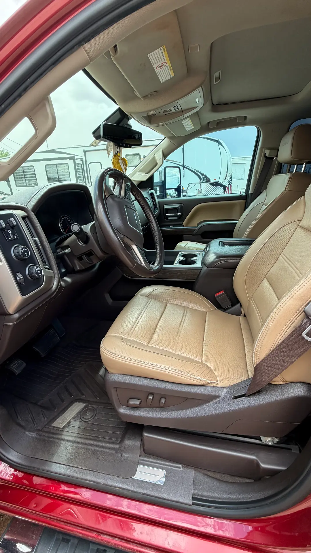 GMC Sierra Denali tan leather front interior after detail
