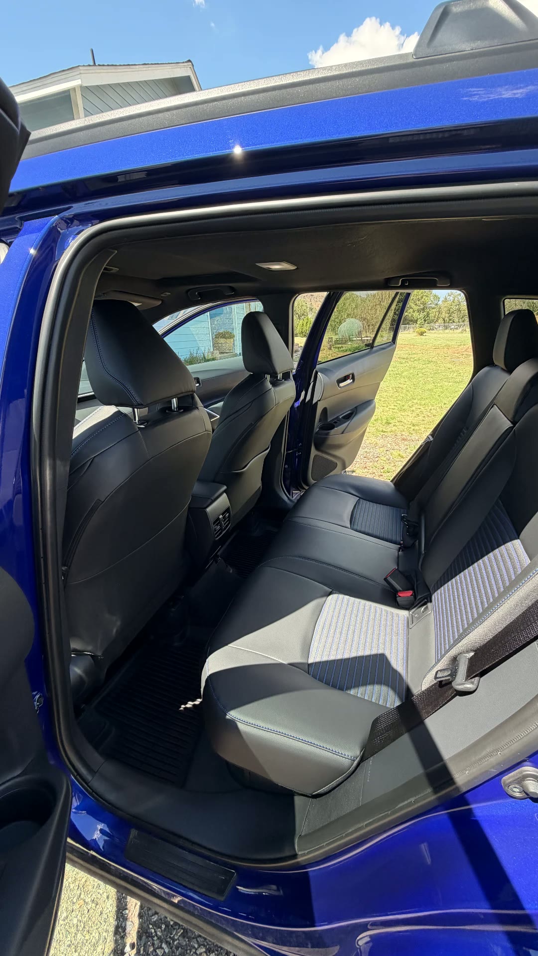 Blue Toyota Corolla Cross rear seats after detail