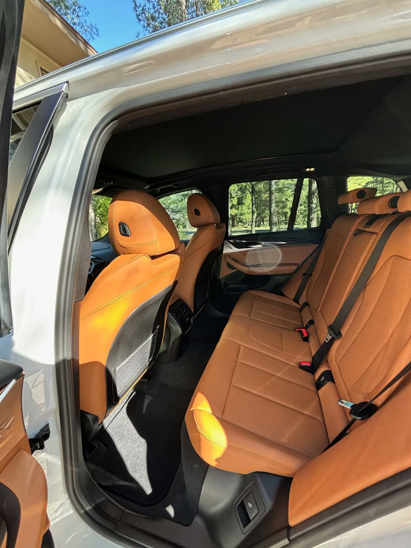 BMW X3 cognac leather rear seats after detail