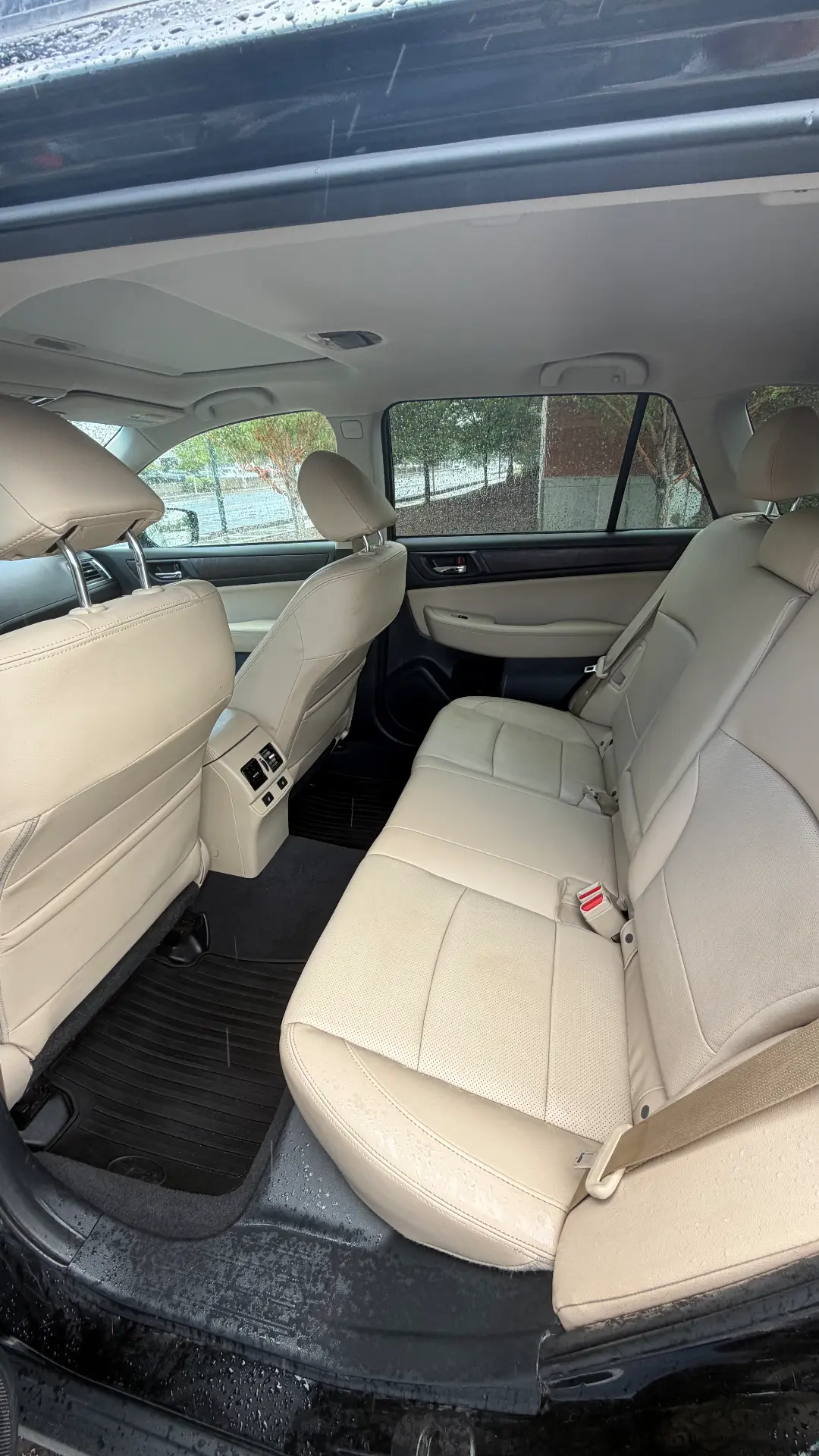 Subaru Outback ivory leather rear seats after detail