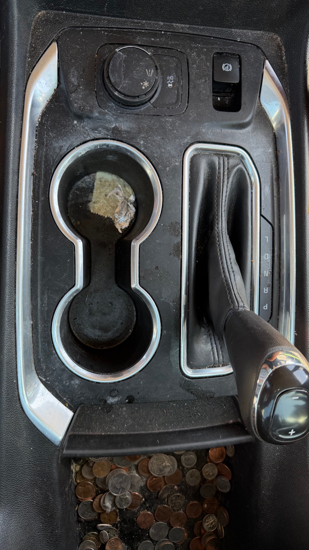 Center console cup holders before cleaning
