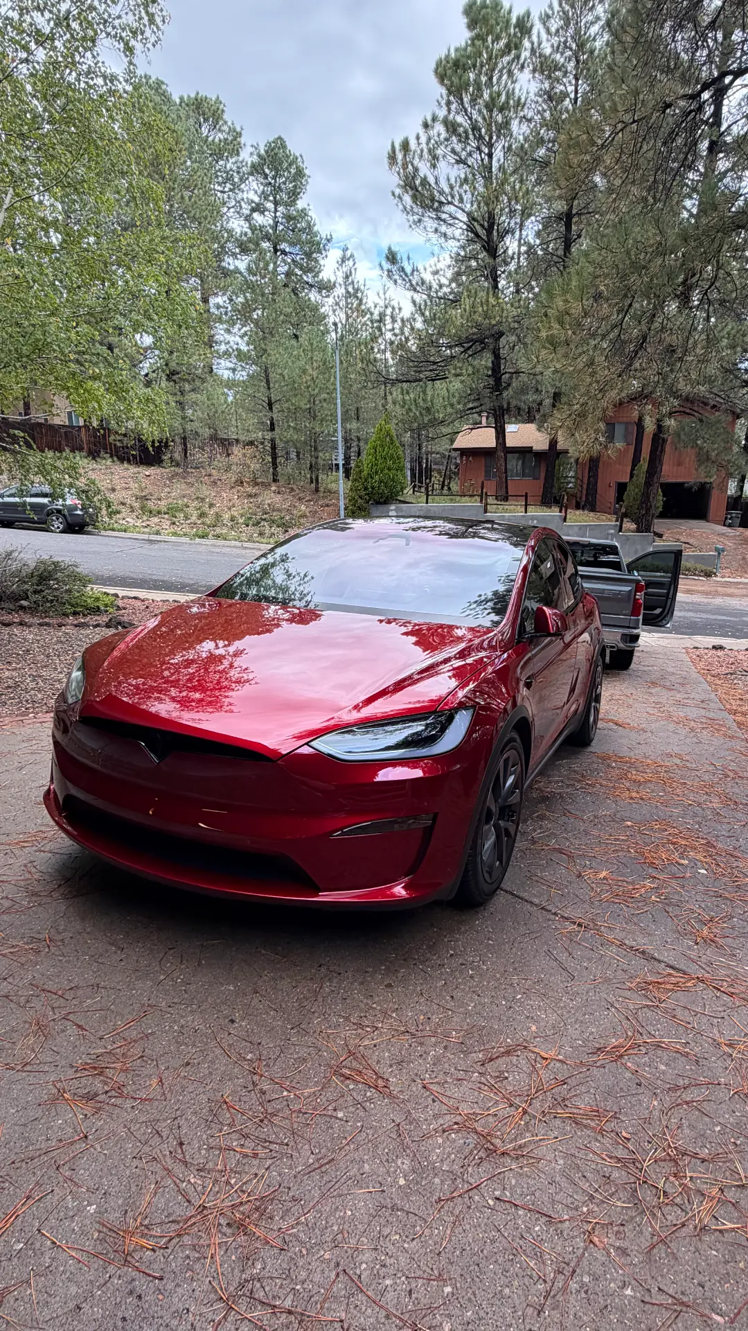 Red Tesla Model X paint shine