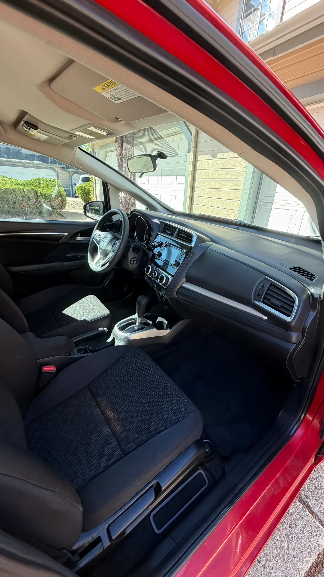 Red Honda Fit interior after detail