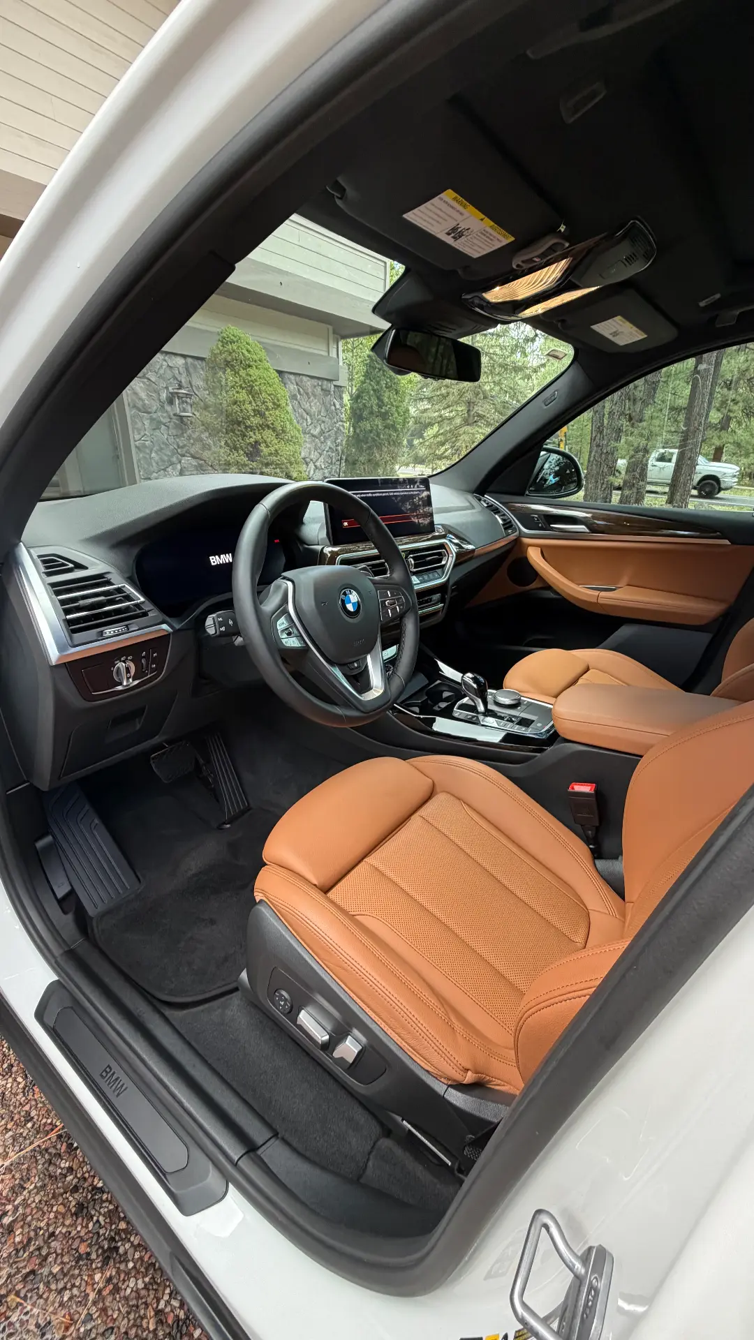 BMW X3 driver side cognac interior after detail