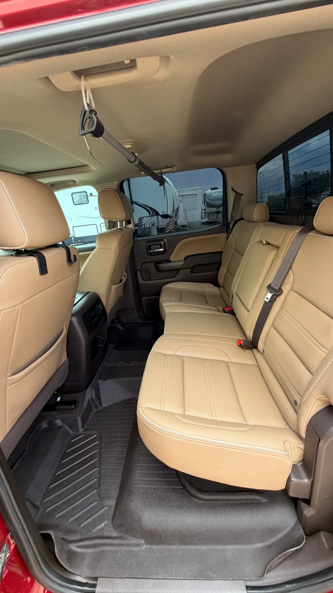 GMC Sierra Denali tan leather rear seats after detail
